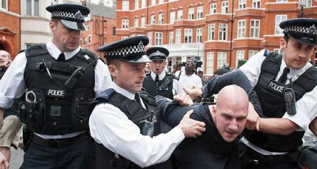 Assange supports rally to protect Ecuador's UK embassy from assault by British police seeking to arrest the Wikileaks founder